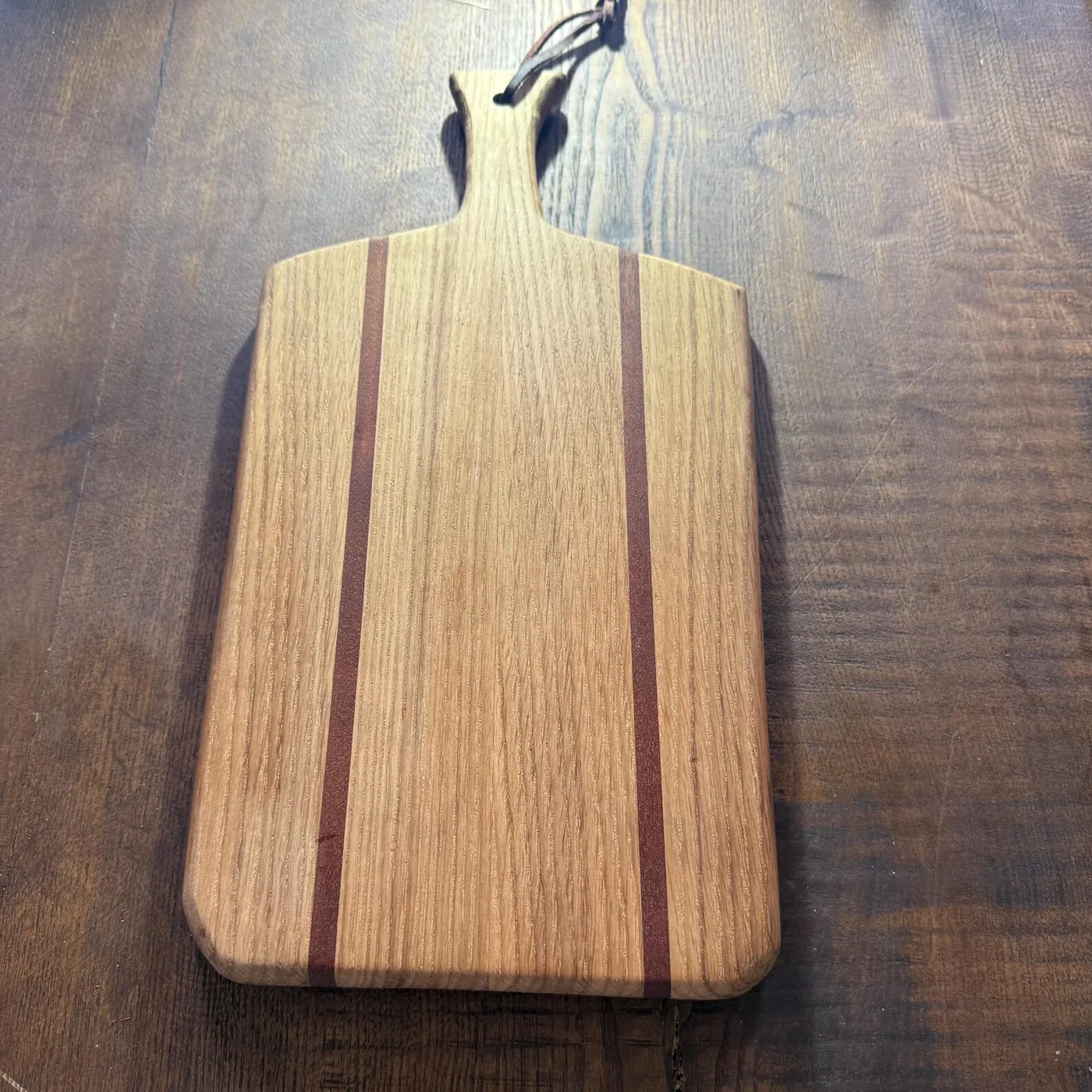 Handcrafted oak and sapele chopping and serving board