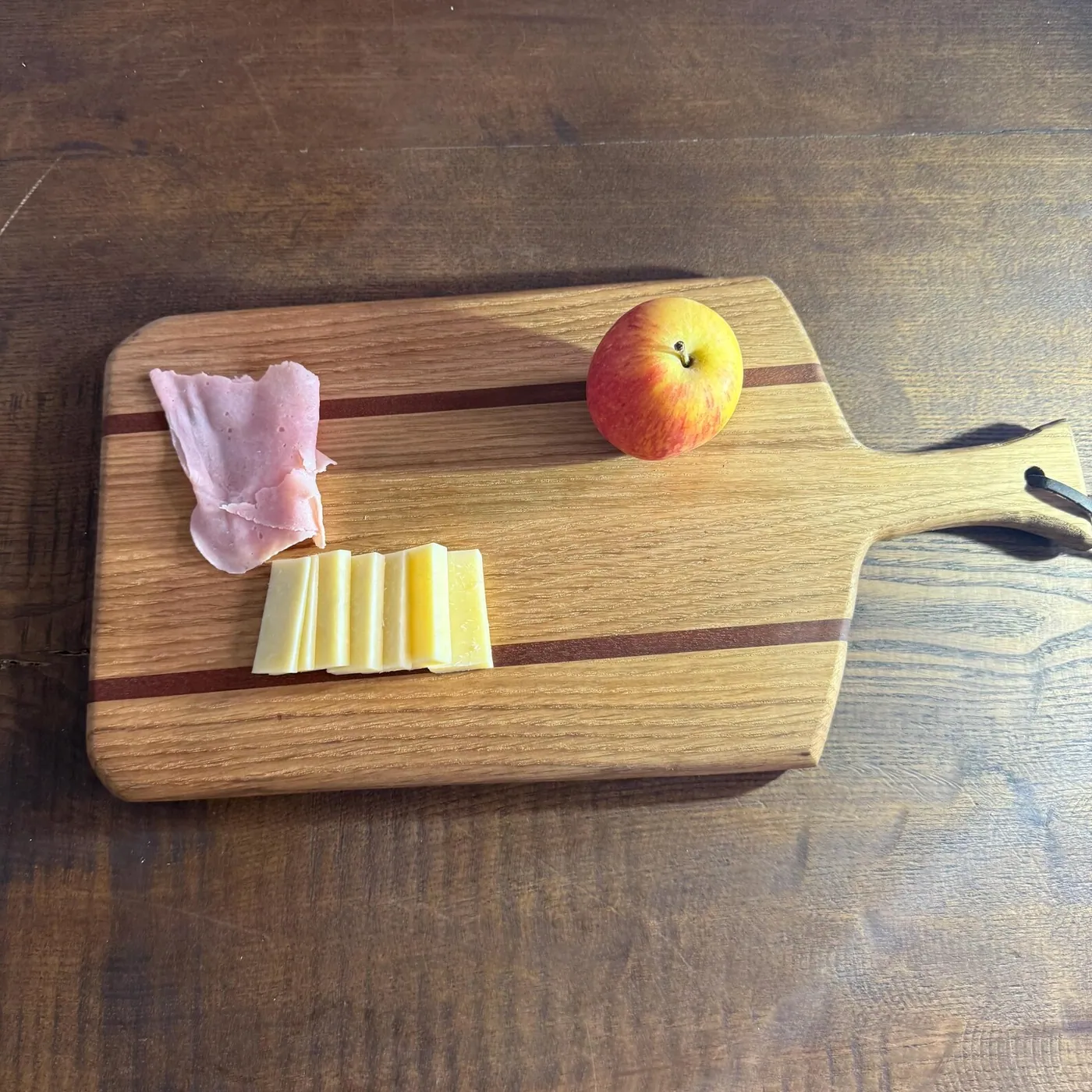 Handcrafted wooden charcuterie and serving board